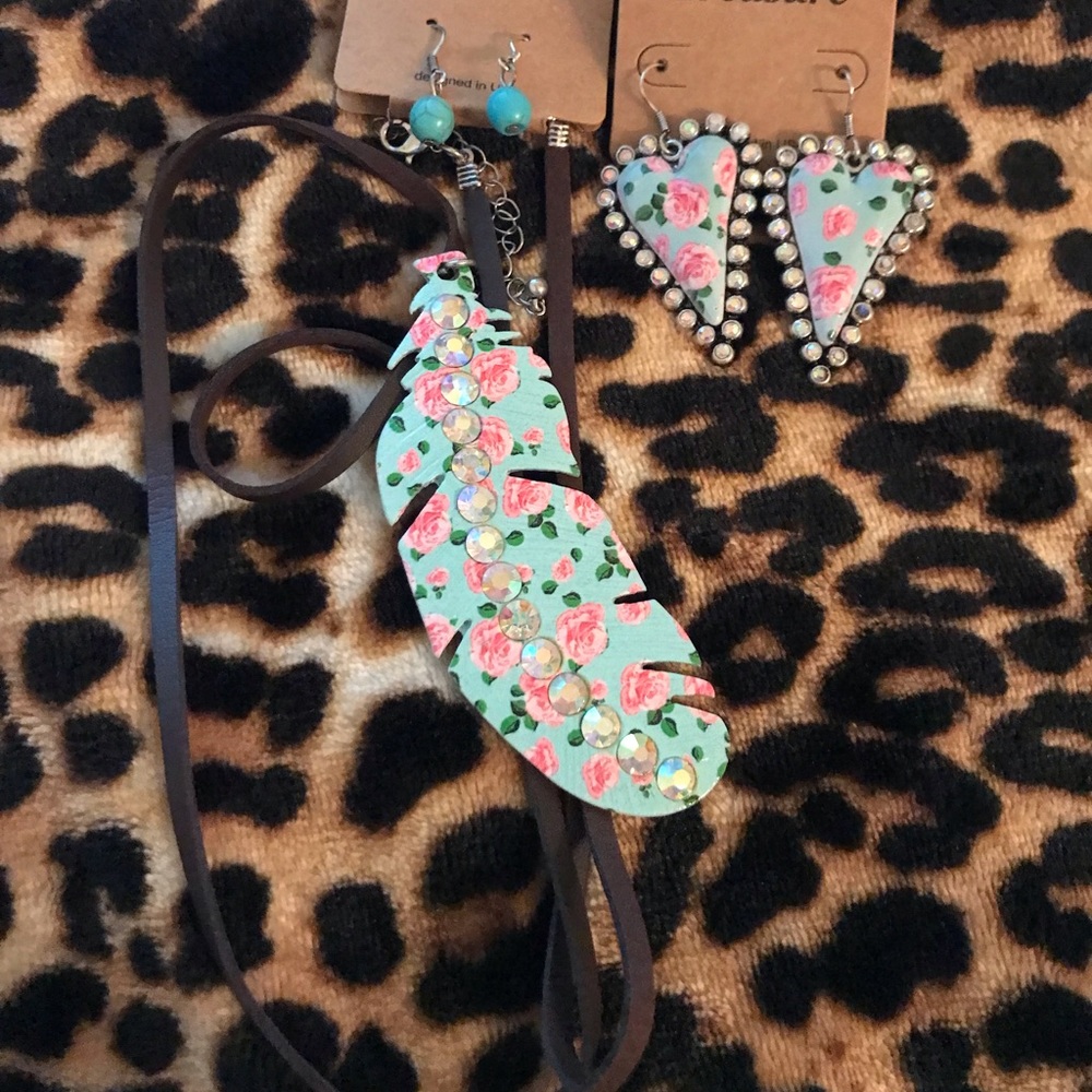 Necklace and earring set along with separate earrings as well.